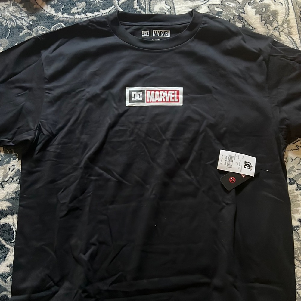 DC marvel T-shirt’s. Black with logo on front. New with tags never worn.